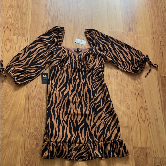 Express Dresses & Skirts - Tiger print ruffle dress